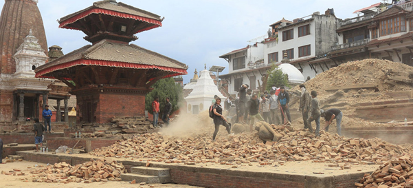 Picture of volunteers clearing rubble at holy site in Kathmandu